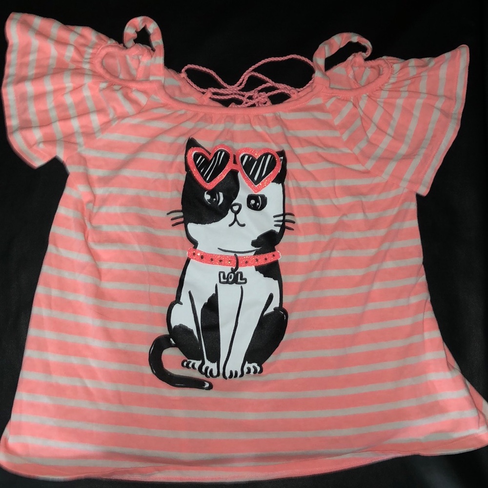 A short sleeve shirt. From justice.